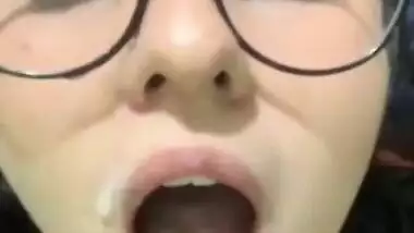 Cute Girl With Glasses Takes Cum All Over Her Face And In Mouth