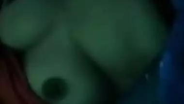 Desi woman hides under the blanket to show XXX tits on video call
